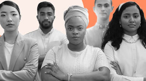 A diverse group of professionals standing confidently with arms crossed, set against a bold orange and white background, representing strength, unity, and determination in promoting inclusion and diversity.