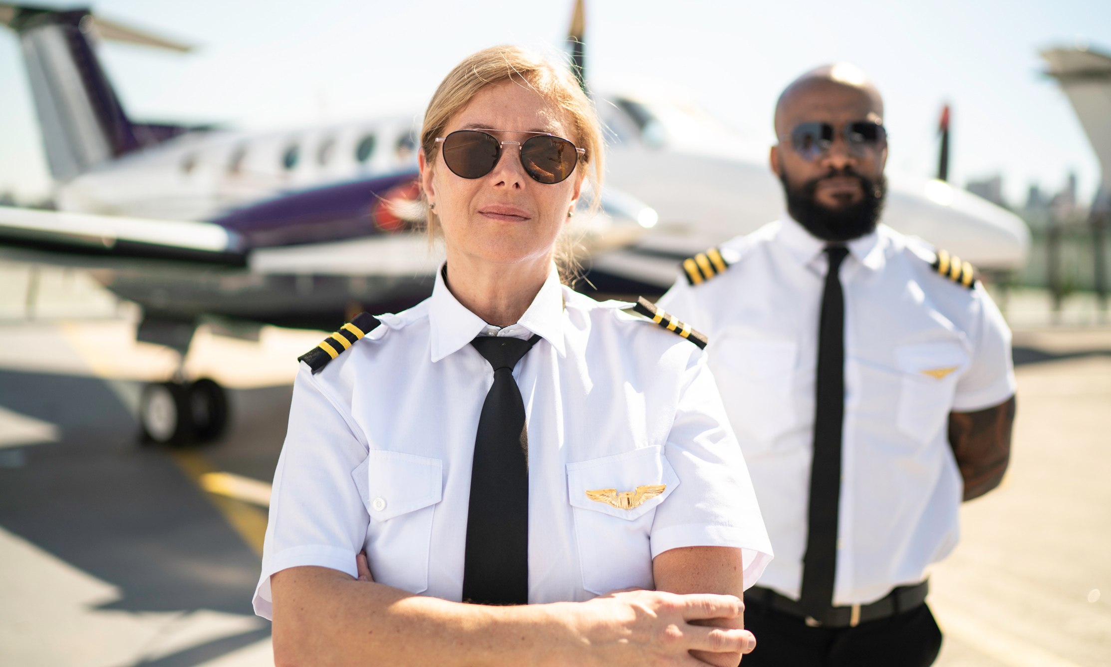 Diverse aviation professionals demonstrating that safety standards and diversity strengthen the aviation industry