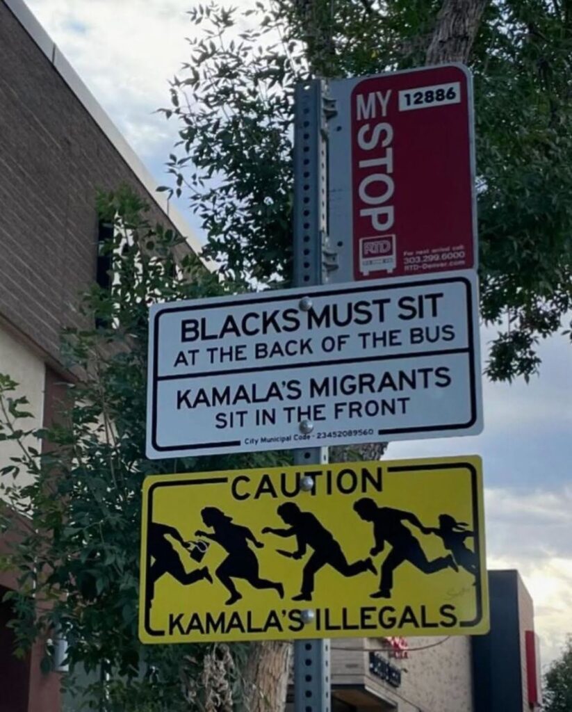 Racist signs targeting Black people and immigrants and Kamala Harris at Bus Stop in Denver.